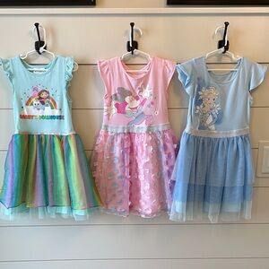 Three girls dresses Gabby, Minnie and Elsa